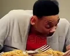 AI-generated image of Will Smith eating spaghetti, 2023