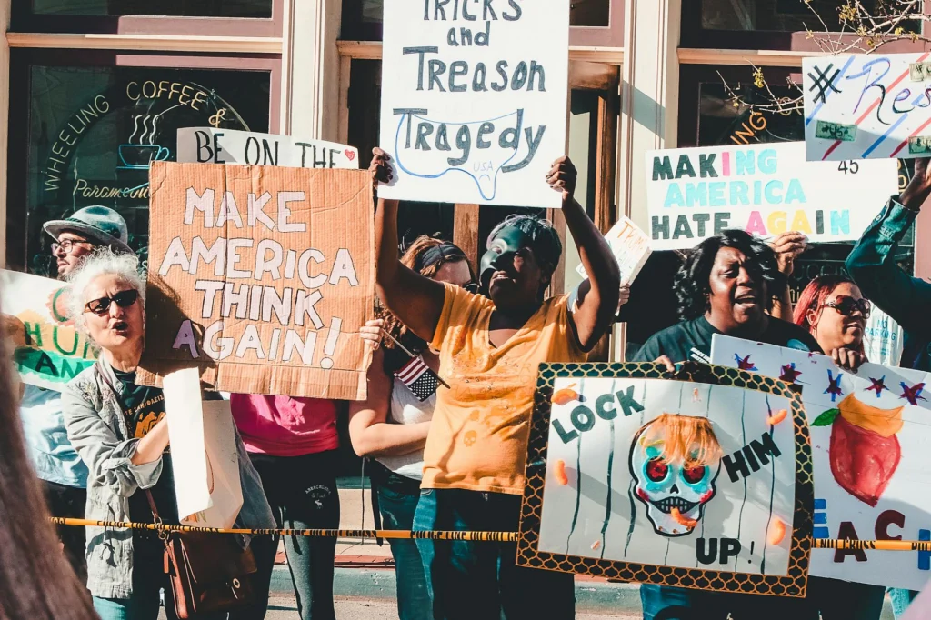 Protest signs at a political rally about racial equality