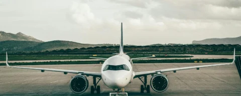 Close-up of an airplane wing illustrating aerodynamic lift physics principles