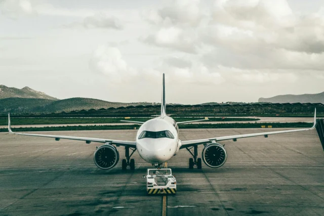 Close-up of an airplane wing illustrating aerodynamic lift physics principles