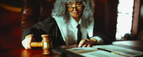 Courtroom with empty jury box illustrating how plea bargaining has replaced trials in criminal justice