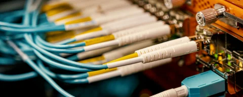 Submarine cables laid on the ocean floor carrying global internet traffic