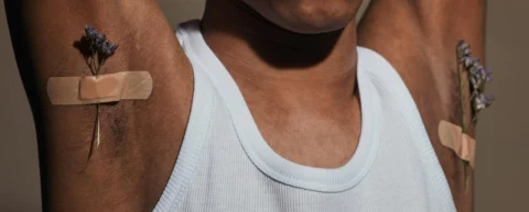 Close-up view of armpit hair showing natural evolution and biological function