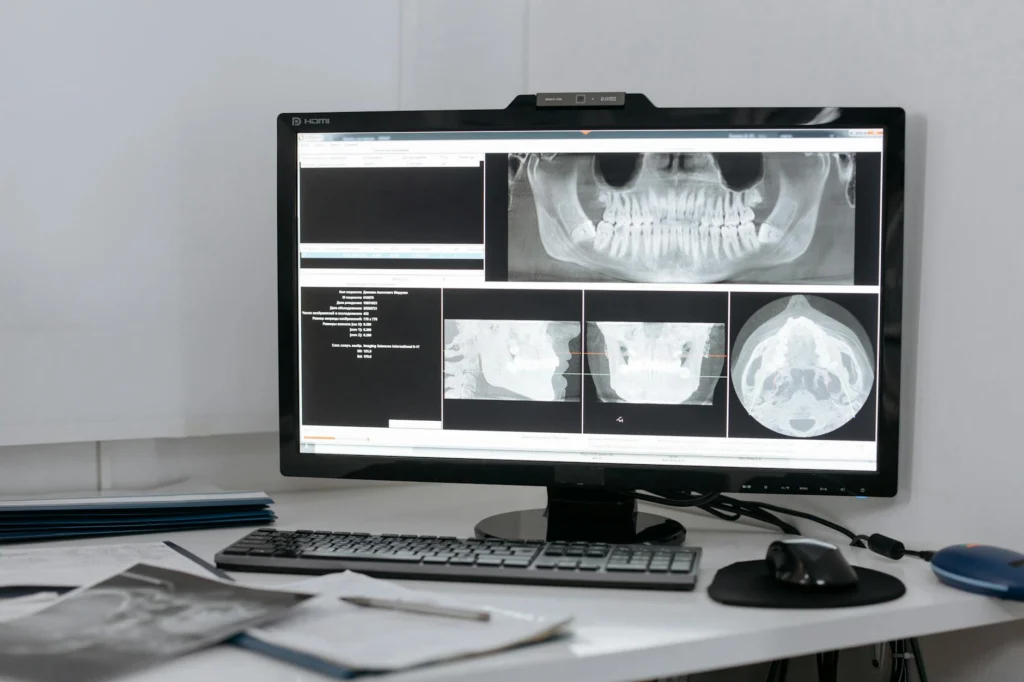 Radiologist examining deepfake medical images on a diagnostic screen
