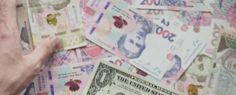 Stack of US dollars symbolizing dollar dominance in global trade