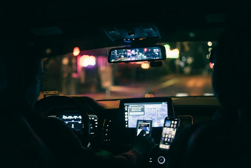 Tired rideshare driver illustrating gig economy exploitation and worker exhaustion
