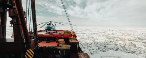 Aerial view of Arctic shipping routes through melting sea ice