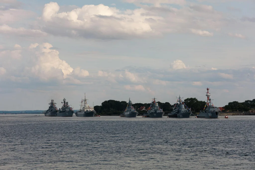 Military warships at sea illustrating gray zone warfare naval operations