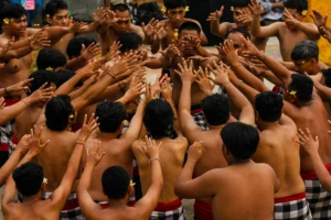 Group participating in synchronized ritual demonstrating social cohesion