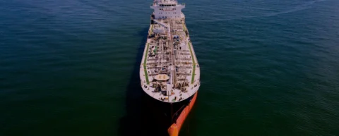 Oil tankers anchored near the Strait of Hormuz illustrating Hormuz chokepoint power