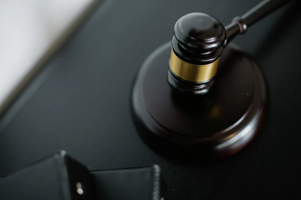 Gavel and scales representing sovereign immunity and international criminal justice