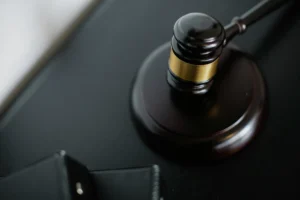 Gavel and scales representing sovereign immunity and international criminal justice