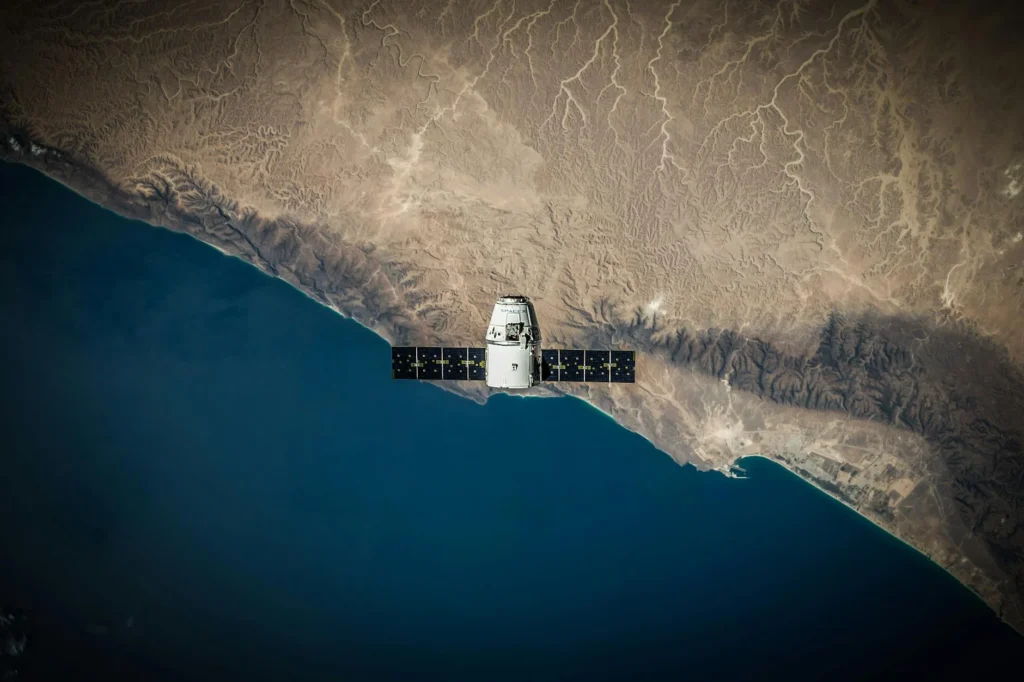 Illustration of space debris liability challenge with orbital fragments surrounding Earth