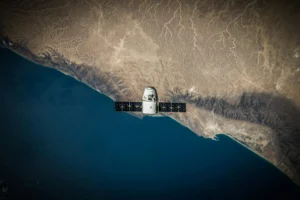 Illustration of space debris liability challenge with orbital fragments surrounding Earth