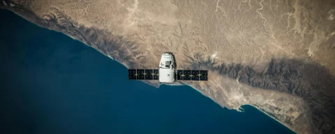 Illustration of space debris liability challenge with orbital fragments surrounding Earth