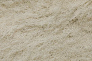 Microscopic view of synthetic fiber chemistry showing polyester textile strands