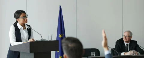 EU AI Act exodus illustrated through an empty tech office in Brussels