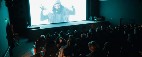 Horror film lighting creates shadows and silhouettes in cinema