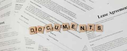 Legal documents representing patent troll costs on innovation
