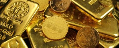 Gold bars in a vault representing gold standard history