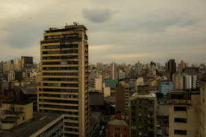 Urban heat island effect visible over city skyline with heat shimmer