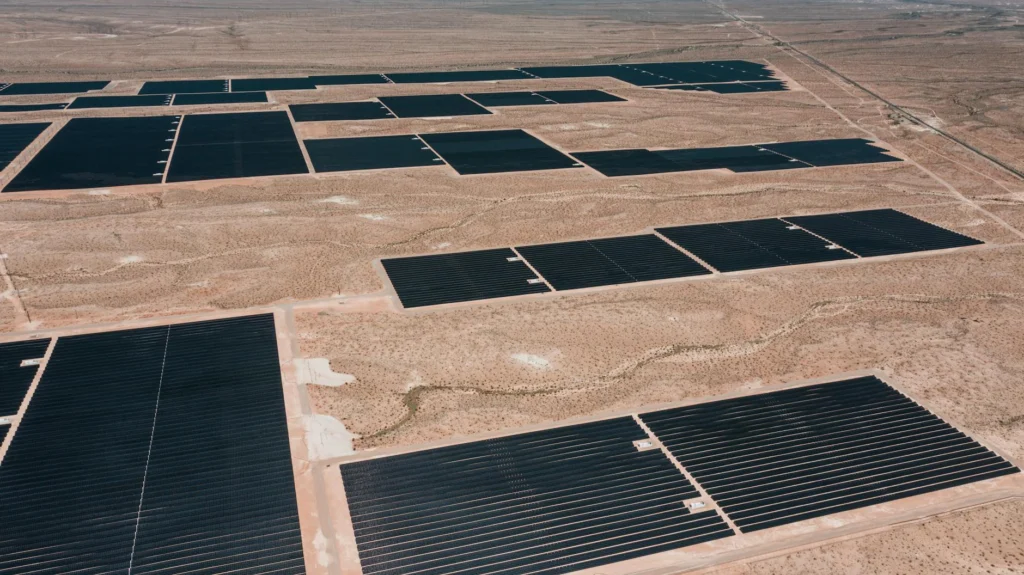 Fossil fuel exporters diversifying into solar energy in desert landscape