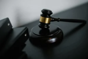 Empty international courtroom illustrating war crimes accountability and the gap in enforcement