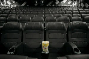 Empty theater seats illustrating prestige film collapse and declining cinema attendance