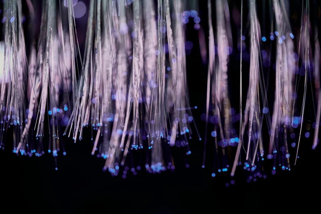 Fiber optic cables transmitting light through total internal reflection