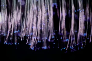 Fiber optic cables transmitting light through total internal reflection