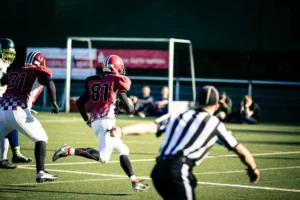 Football player demonstrating aging athlete physiology through continued athletic performance