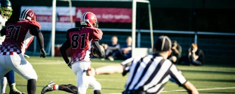 Football player demonstrating aging athlete physiology through continued athletic performance