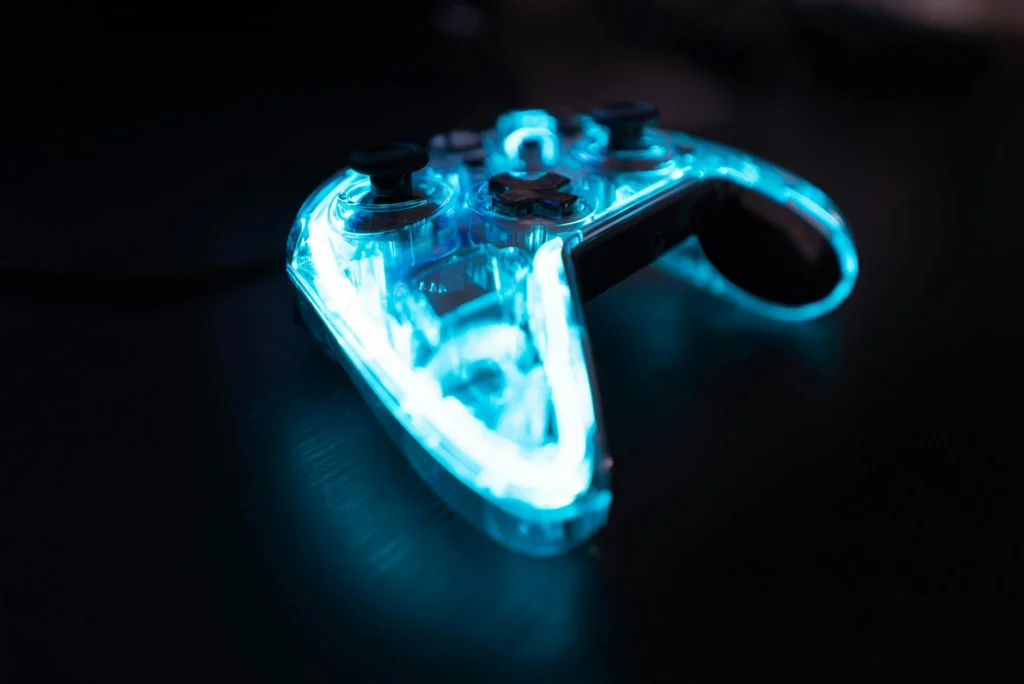 Gaming controller with neon lighting representing V-Bucks digital currency ecosystem