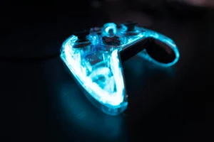 Gaming controller with neon lighting representing V-Bucks digital currency ecosystem