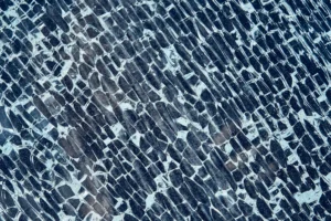 Microscopic view illustrating glass transition physics and amorphous solid structure