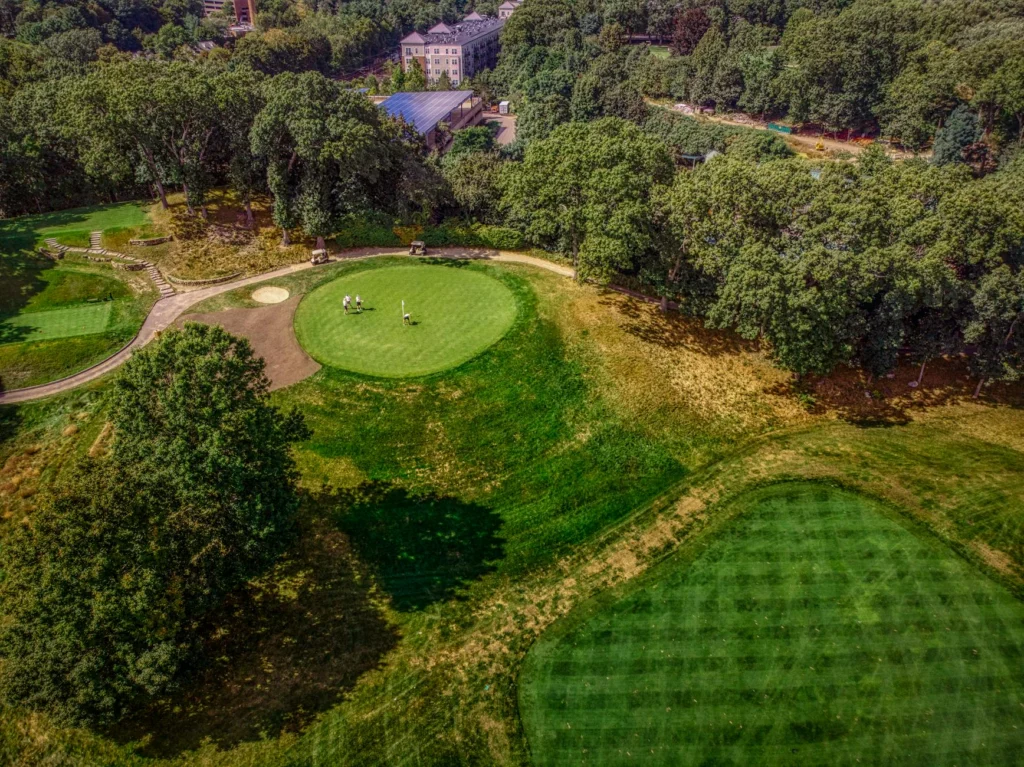 Aerial view of a professional golf course representing DP World Tour logistics operations