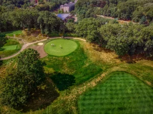 Aerial view of a professional golf course representing DP World Tour logistics operations
