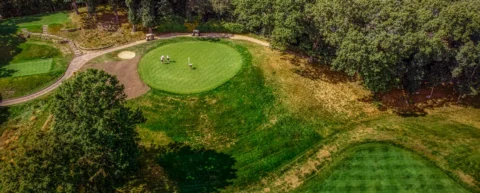 Aerial view of a professional golf course representing DP World Tour logistics operations