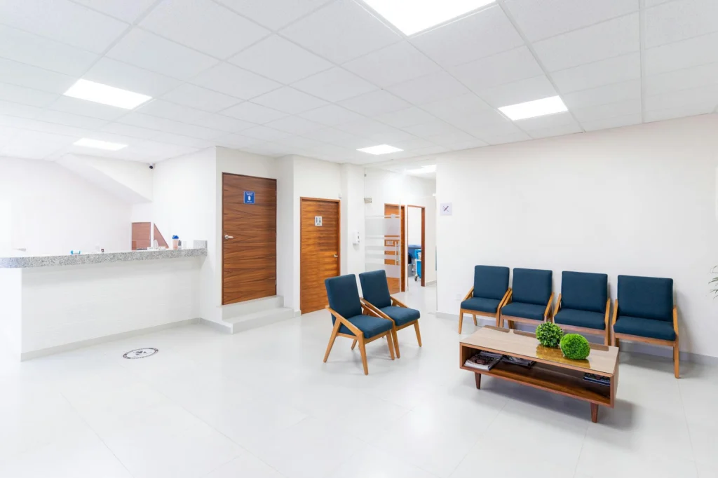 Empty medical clinic waiting room illustrating the Medi-Cal payment crisis facing California providers