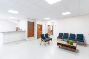 Empty medical clinic waiting room illustrating the Medi-Cal payment crisis facing California providers
