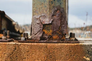 Close-up of metal corrosion chemistry showing iron oxide rust formation on steel surface