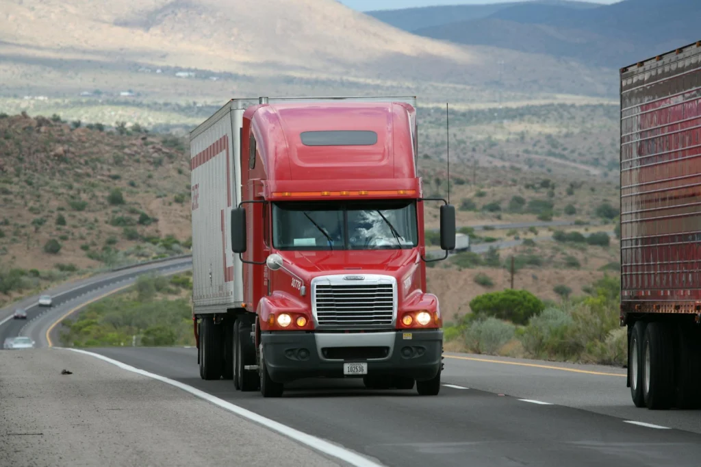 Semi truck on highway illustrating truck driver fatigue risks in modern logistics