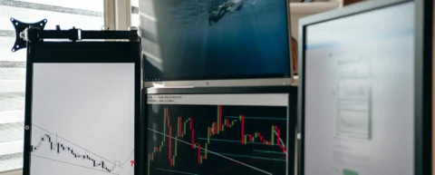 Trading screens displaying flash crash fragility in financial markets