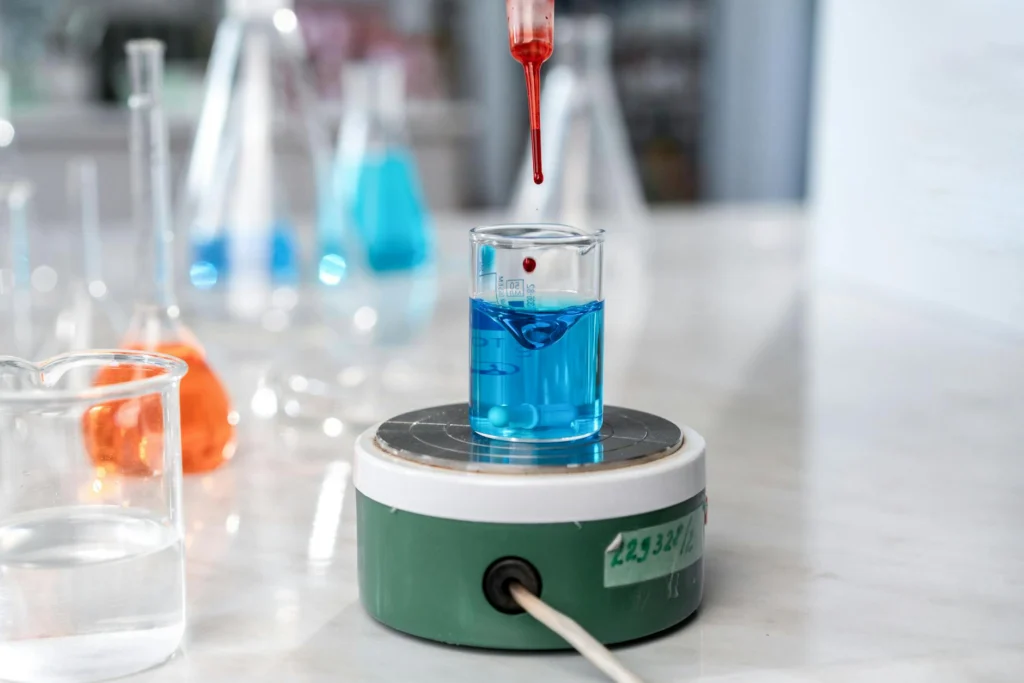 Magnet levitating above a superconductor demonstrating the Meissner effect in room-temperature superconductor research