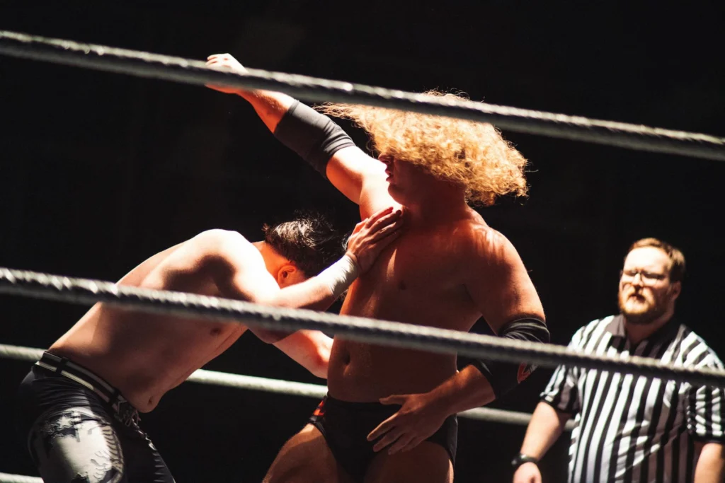 Wrestling ring under spotlight representing a wrestling career renaissance