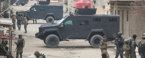Military checkpoint at contested border illustrating border conflict escalation dynamics