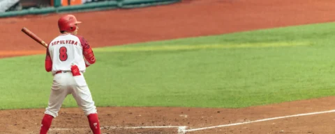 Baseball batter at the plate illustrating Giants roster construction and analytics