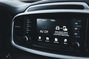 In-car connectivity screen showing software controls on a modern vehicle dashboard.