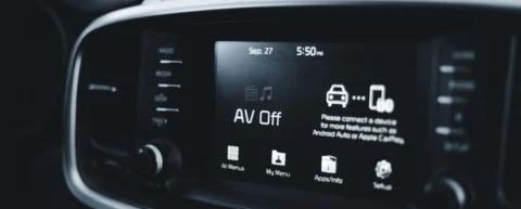 In-car connectivity screen showing software controls on a modern vehicle dashboard.
